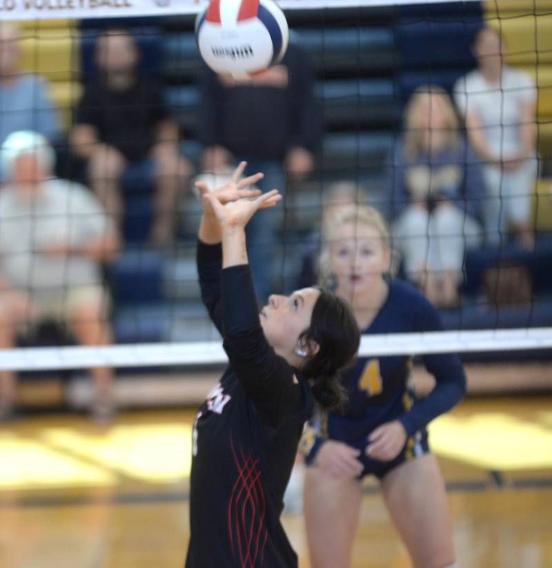 Amboy's Jadyn Whelchel sets the balls against Polo at the Polo Invite on Saturday, Sept. 27, 2025.