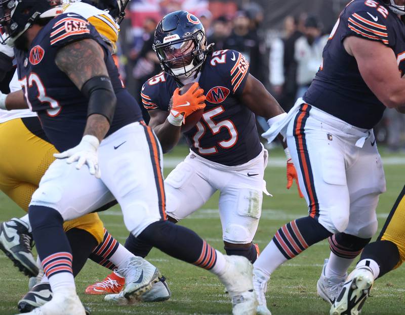 Chicago Bears running back Kyle Monangai finds a hole in the Pittsburgh Steelers defensive line Sunday, Nov. 23, 2025, during their game at Soldier Field in Chicago.
