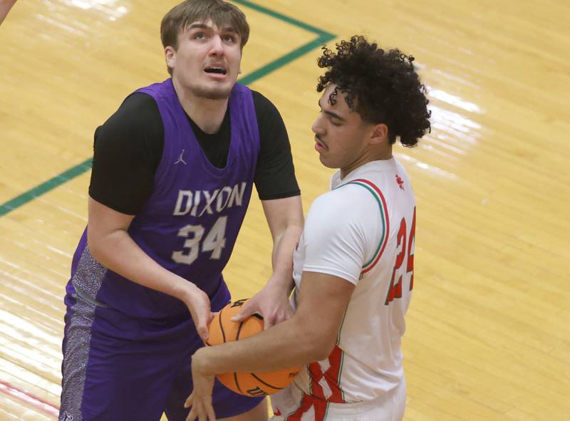 L-P's Marion Persich steals the ball from the hands of Dixon's Armahn McGowan under the hoop during the Class 3A Regional semifinal game on Wednesday, Feb. 25, 2026 in Sellett Gymnasium at L-P High School.