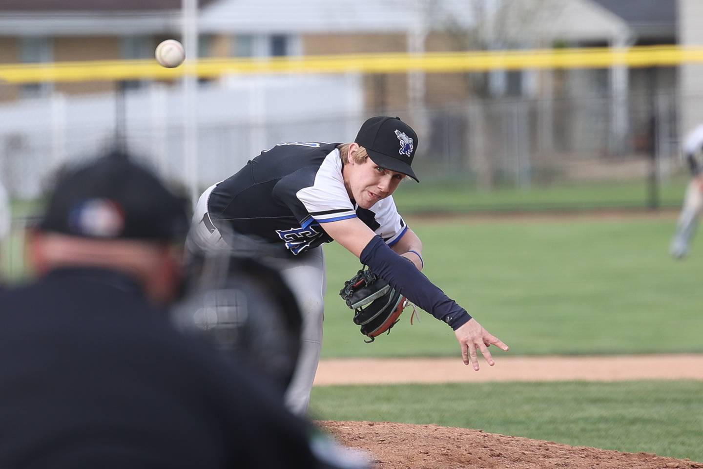 Lincoln-Way East’s Ethan Godlewski delivers a pitch against Lockport on Monday, April 22, 2024 in Lockport.