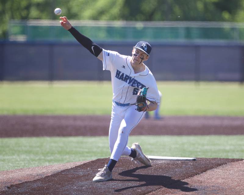 Harvest Christian's Kadeen Meeker delivers a pitch against Marquette at the Class 1A Sectional Final on Saturday May 25, 2024 in Elgin.