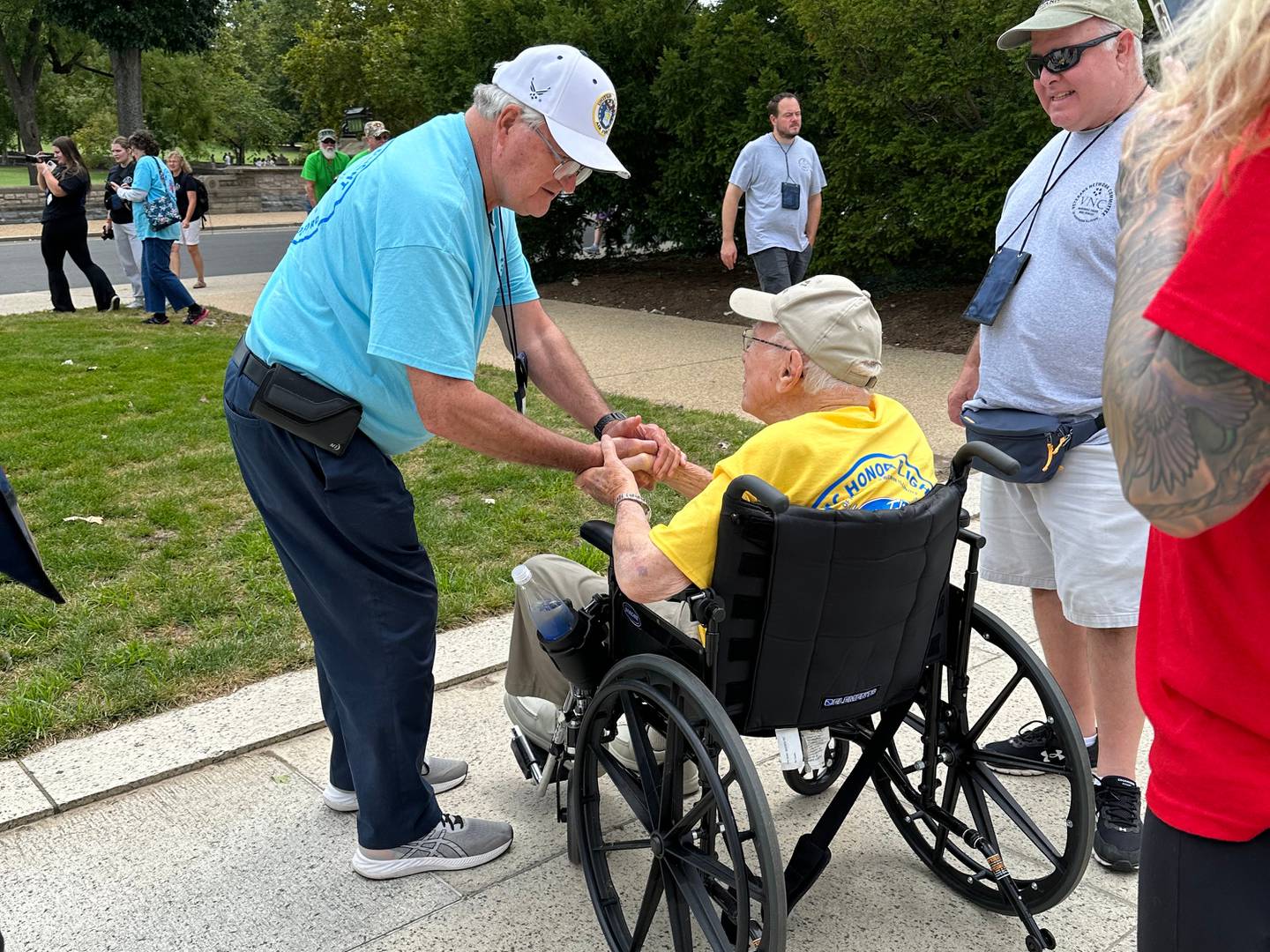 Barry Phelps and John Rickerd on this year's Honor Flight. Phelps invited Rickerd to share his experiences in WWII with McHenry High School students.