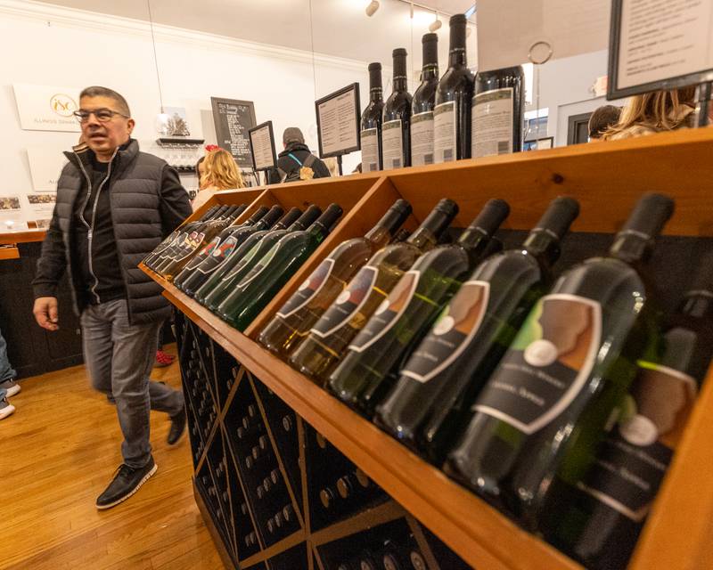 Bottled Wine is displayed at August Hill’s tasting room during the wine walk on Feb. 14, 2026 on Mill Street in Utica.