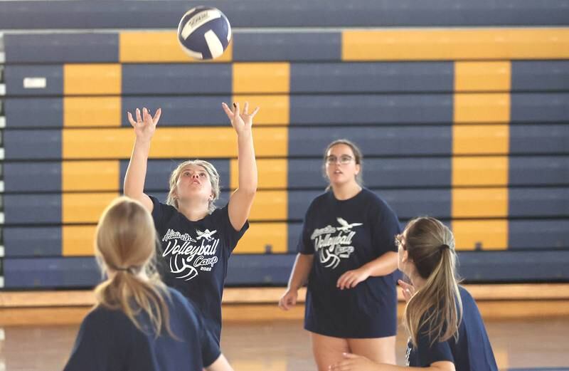 Hiawatha's Crystal Haack sets the ball Thursday, June 30, 2022, during a summer volleyball match against Hinckley-Big Rock at Hiawatha High School in Kirkland.