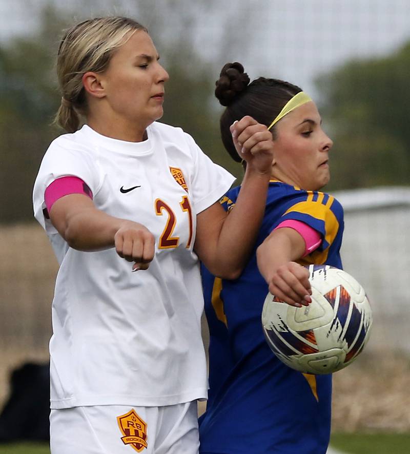 Richmond-Burton's Blake Frericks and Johnsburg's Liz Smith try to control the ball during the Kishwaukee River Conference Girls Soccer Tournament Championship match on Wednesday, May 6, 2026, at Johnsburg High School.