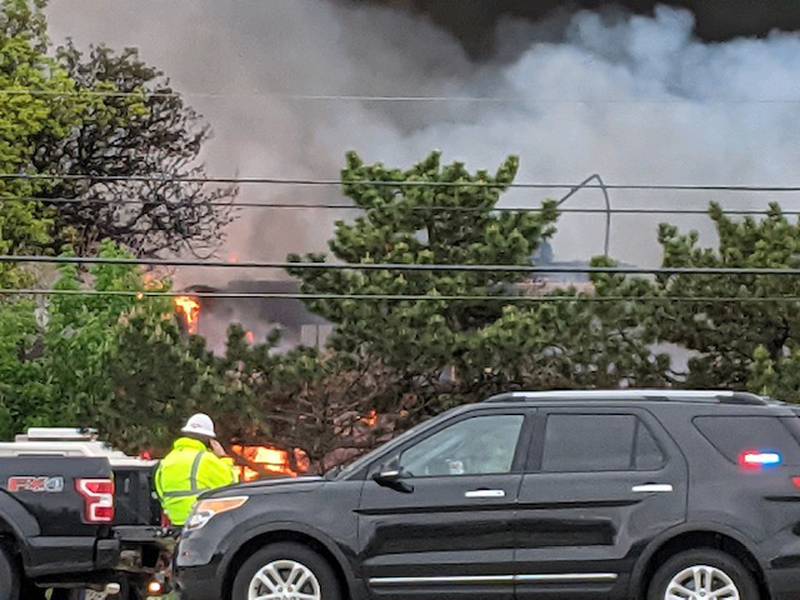 Firefighters and emergency vehicles gather at the scene of a structure fire at the former Pheasant Run on Saturday in St. Charles.