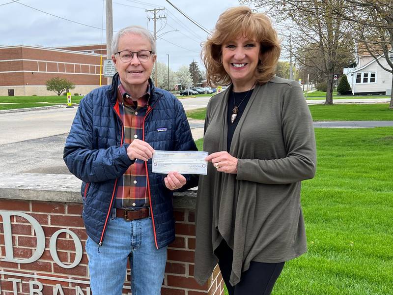 Pictured (left to right): Community Foundation Board member Michael Constant delivering a  spring 2022 grant check to Open Door Rehabilitation Center's Program Coordinator Laurie Wisdom