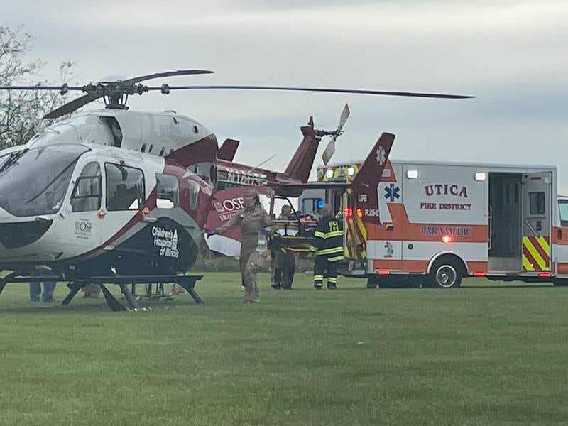 A woman was taken by Utica ambulance to a Life Flight helicopter Friday, Sept. 23, 2022, after she was extricated from a conveyer belt about 40 feet above the ground at the Corteva AgriScience facility, north of Utica.