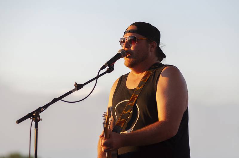 The frontman for the "Sublime" tribute band "Secondhand Smoke" jams Saturday, July 2, 2022 on the G&M Stella main stage at Dixon’s Petunia Fest.