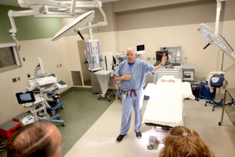 Anesthesia Technician Robert Locke shows visitors an operating room during a public open house for the new Mercyhealth hospital in Crystal Lake on Saturday. The facility features four operating rooms.