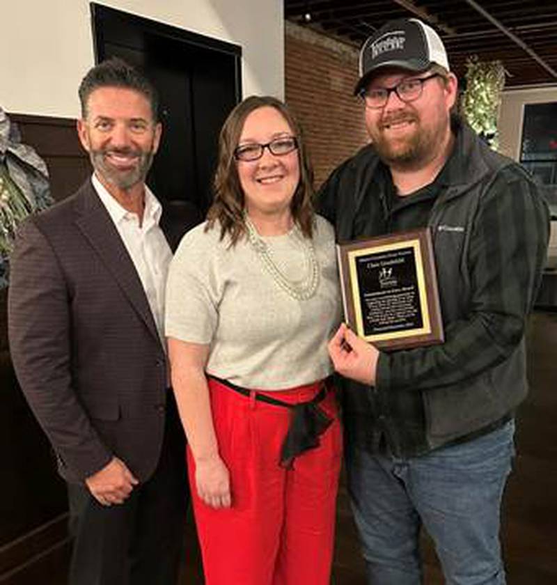 Chris Goodchild, of NECA IBEW Local 176 JATC, and his team of apprentices were honored for their work and donation of time to the new ICILA home that opened in October of this year, which now provides a forever home for three individuals to flourish. Pictured is Friendship House Executive Director Tony Barrett, director of Residential Ashlee Herbold and Chris Goodchild.