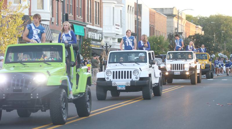 The Princeton High School Homecoming court passes down South Main Street during the Homecoming parade on Thursday, Oct. 3, 2024 downtown Princeton.