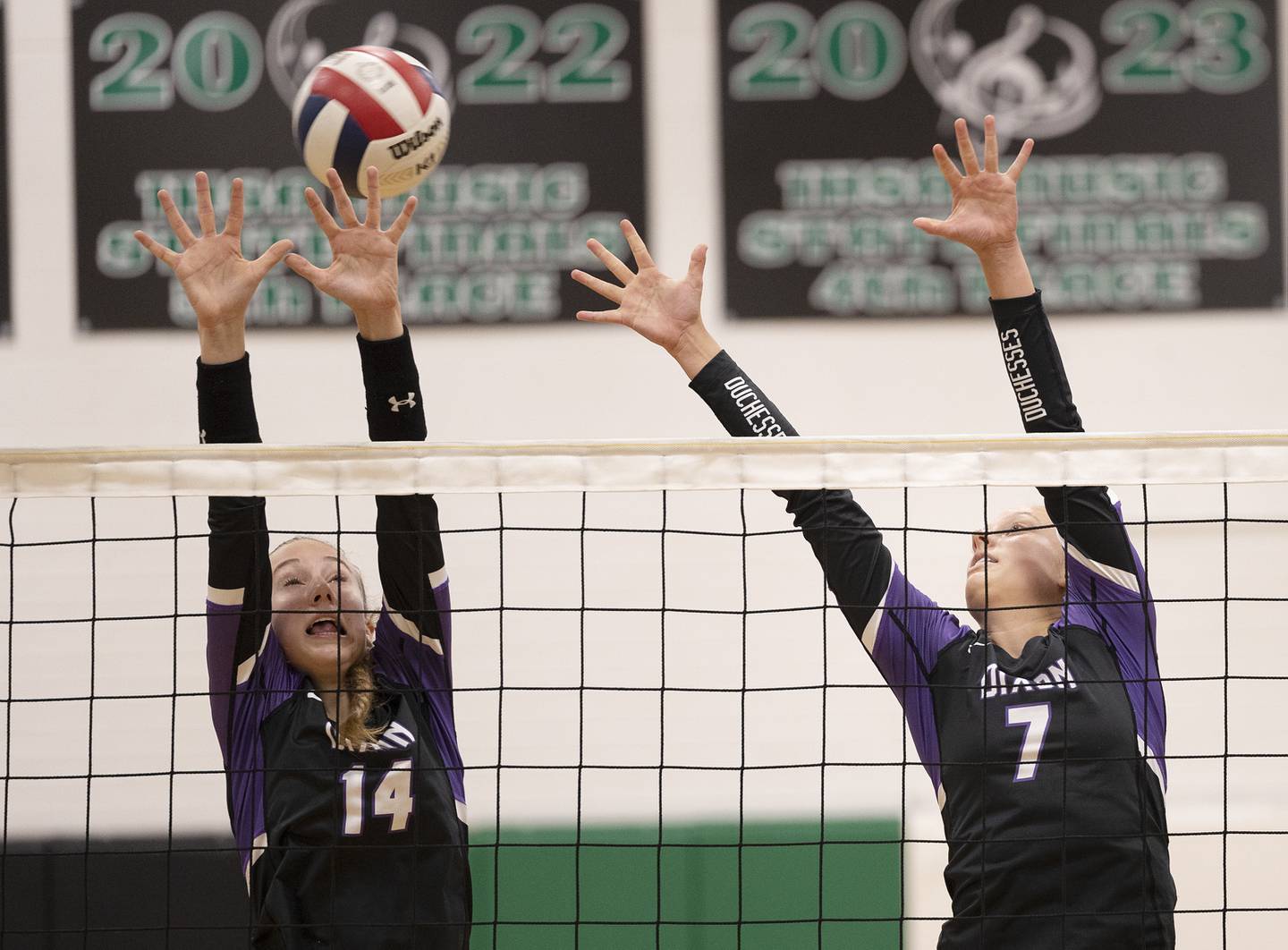 Dixon’s Leah Carlson and] Makenzie Toms go up for a block against Rock Falls Thursday, Sept. 19, 2024, in a Big Northern Conference match at RFHS.
