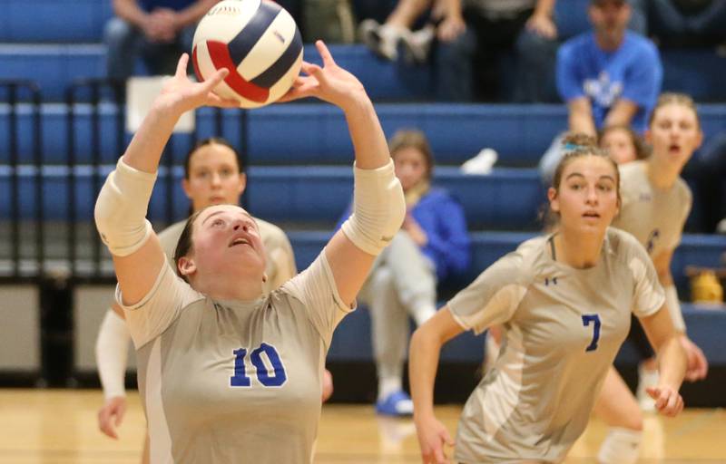 Princeton's Makayla Hecht sets the ball in the air for teammate Kathy Maciczak in the Class 2A Regional Semifinals on Tuesday, Oct. 29, 2024 at Fieldcrest High School.