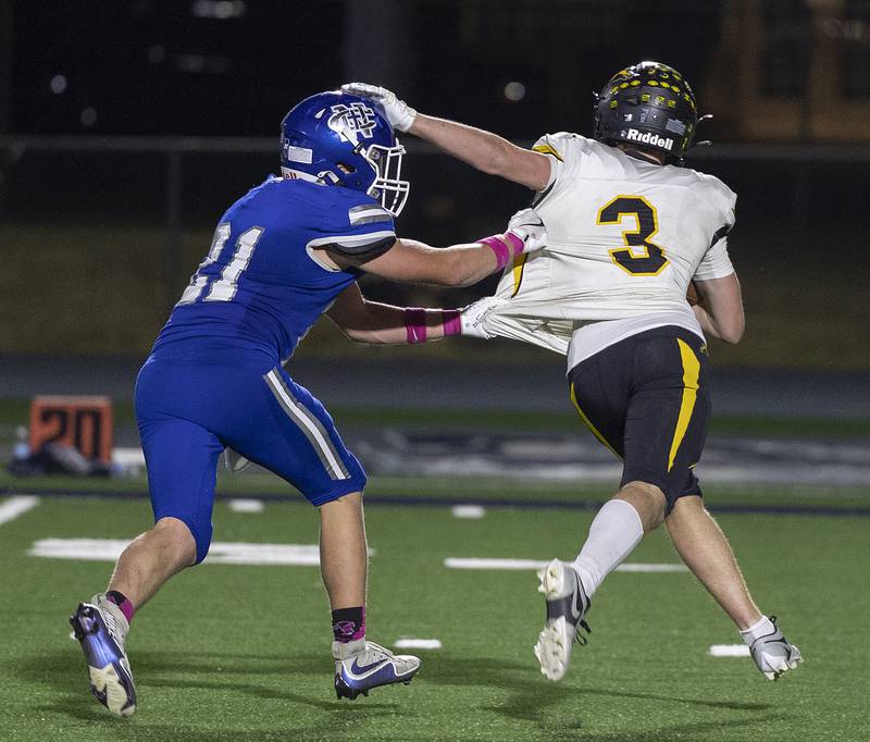 Newman’s Briar Ivey gets Riverdale’s Caen Beckett in his grasp Friday, October 11, 2024, in Sterling.