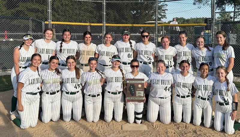 Members of the St. Bede softball team pose with the Class 2A Regional final plaque on Friday, May 23, 2025 at St. Bede Academy.