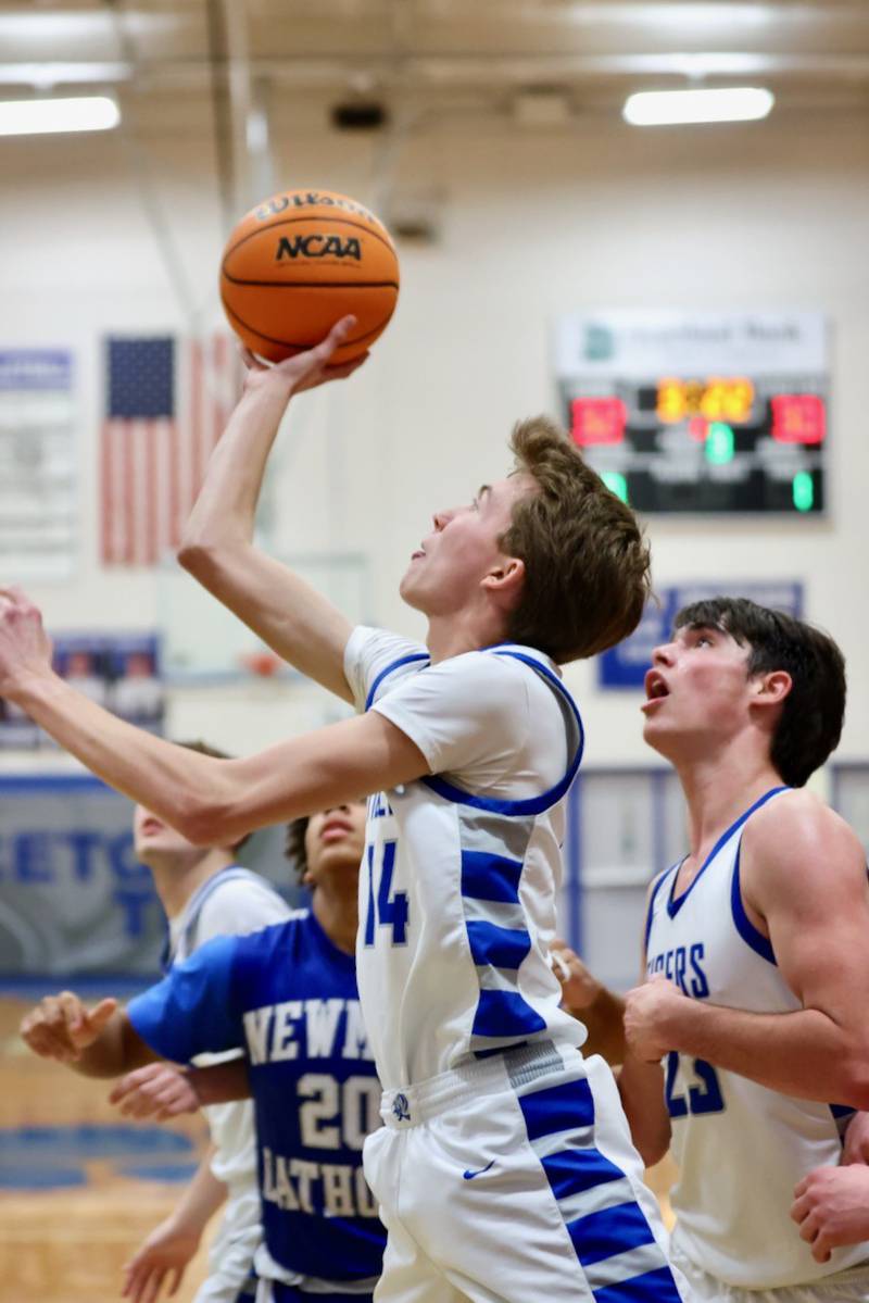 Princeton's Jackson Mason shoots against Newman Friday night at Prouty Gym. The Tigers won 60-46.