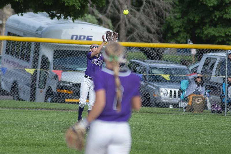 Dixon's Morgan Leslie hauls in a fly ball against Rochelle Tuesday, May 24, 2022.