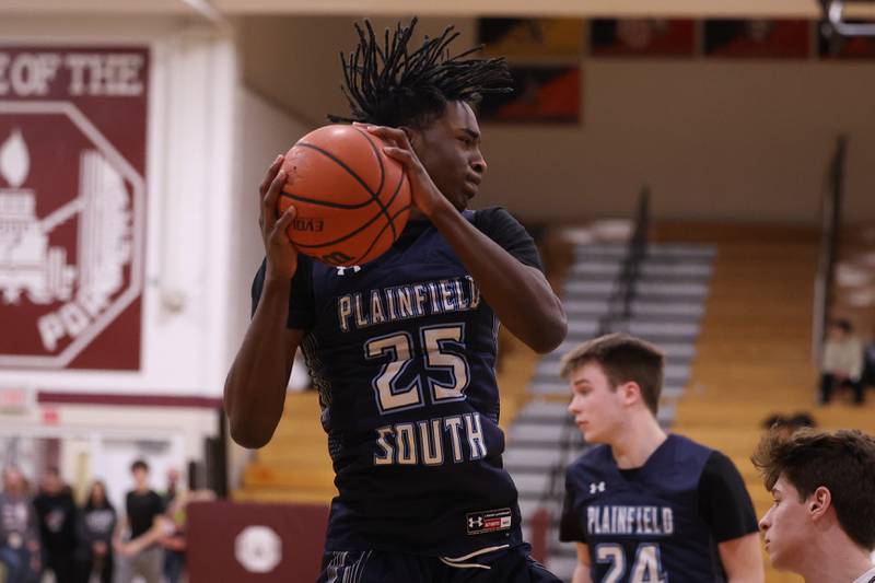 Plainfield South’s Jeremiah LeSure pulls in the defensive rebound against Lockport on Wednesday January 25th, 2023.
