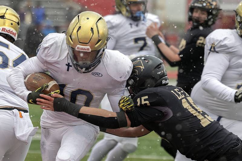 Althoff Catholic’s Dierre Hill Jr. scores a touchdown as Lena-Winslow's Koby Kearns is late on the tackle Friday, Nov. 29, 2024, in the class 1A football state final.