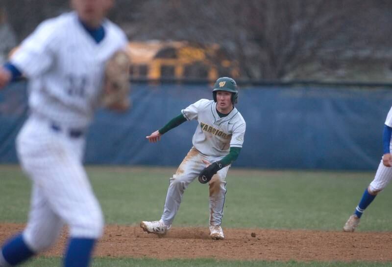 Waubonsie Valley's Ryan Lucas takes off for third base during a game against Geneva on Wednesday, April 9, 2025 in Geneva.