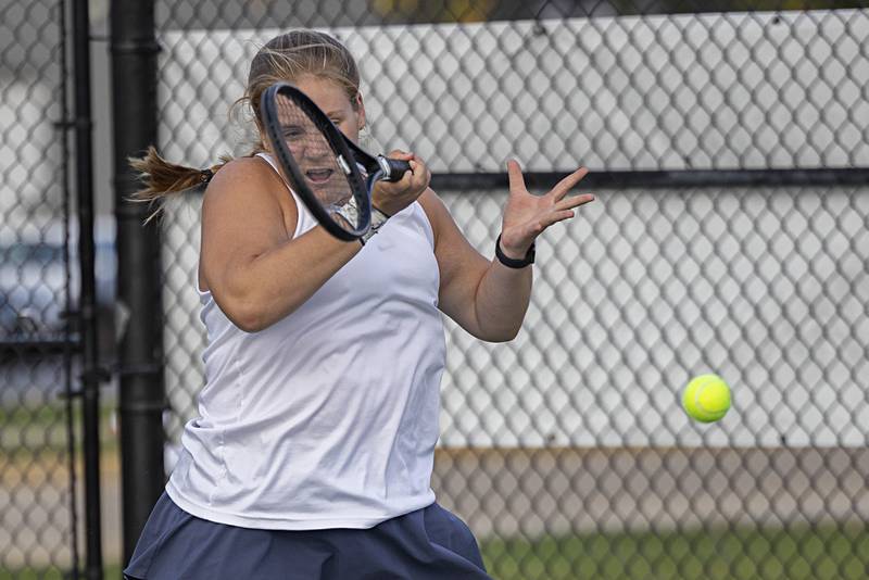 Sterling’s Ellie Aitken plays a shot against Dixon’s Grace Ferguson Thursday, Sept. 28, 2023 in a match at Sterling.