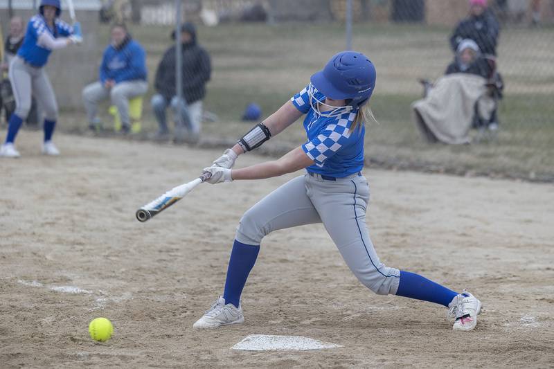 Newman’s Sam Ackman drives in Newman’s first run to tie the game against Annawan-Wethersfield Wednesday, March 22, 2023.