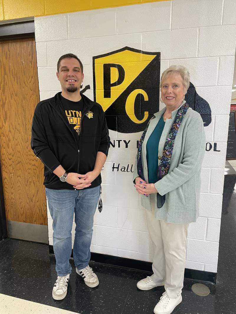 Putnam County High School Guidance Counselor Tyler Ellena is joined by Putnam County Rotary President Cheri Adrian as they prepare for this week's Scholarship Showcase 2025. The event will be from 2 to 4 p.m. Saturday, Jan. 11 in the High School Commons. All PCHS seniors and their parents are encouraged to attend.