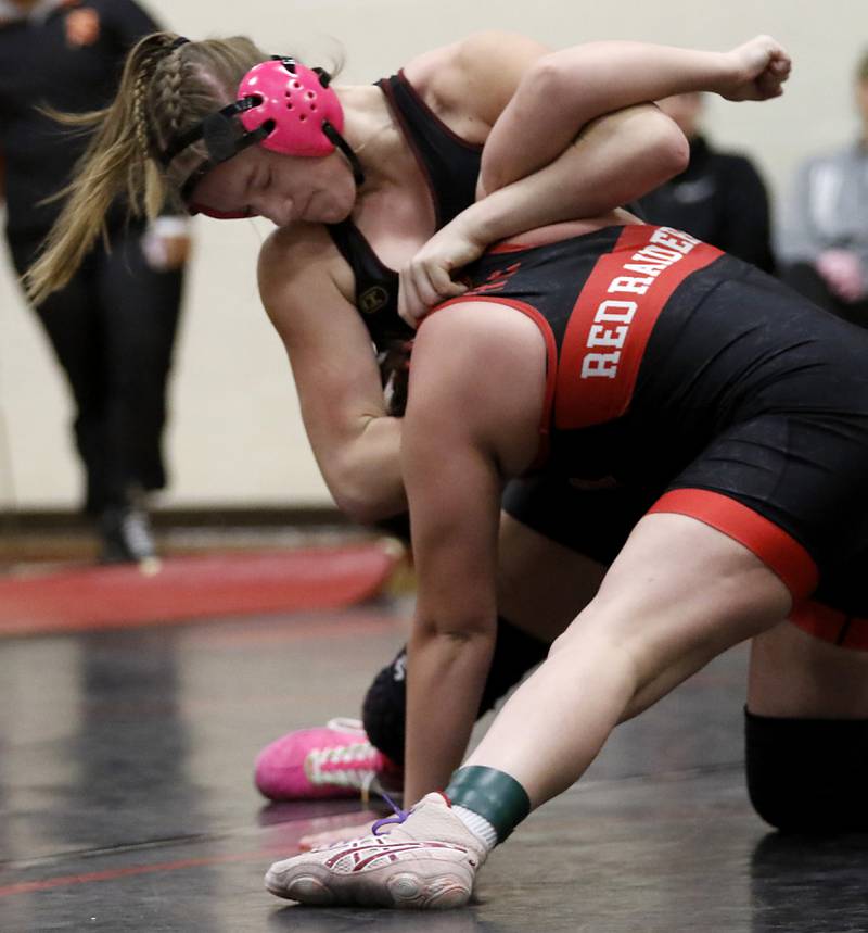 Morris’ Olyve Havens tries to take down Huntley’s Abigail Ward in the 145-pound match of a nononference wrestling meet on Wednesday, Jan. 22, 2025, at Huntley High School.