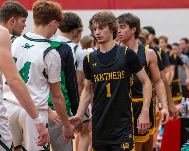 Jacob Fubar (1) of Putnam County leads team in post game high five line after loss in game versus Rock Falls in the Colmone Classic on Monday, December 8, 2025 at Hall High School in Spring Valley.