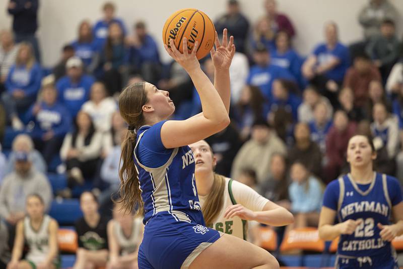 Newman’s Veronica Haley goes to the hoop against Wethersfield Thursday, Feb. 26, 2026, in the Class 1A sectional semifinal at Eastland.