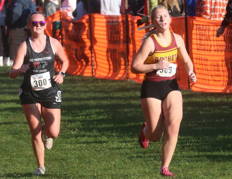 Erie-Prophetstown's Brooke Lalley and Richmond Burton's Alexis Buntenbach compete in the Class 1A Cross Country Finals on Saturday, Nov. 4, 2023 at Detweiller Park in Peoria.