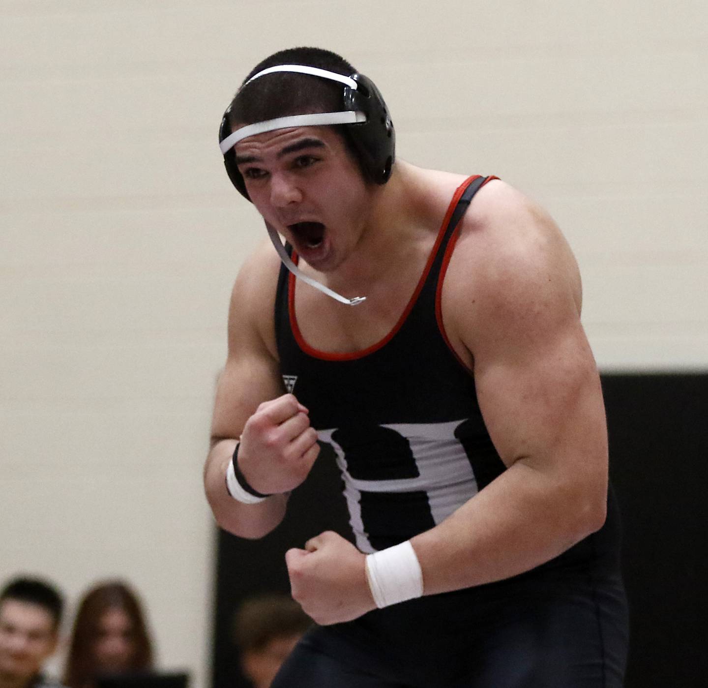 Huntley’s Markos Mihalopolus celebrates defeating Hampshire's Joseph Ochoa during the 285-pound match of a Fox Valley Conference wrestling match Wednesday, Jan. 24, 2024, at Huntley High School.