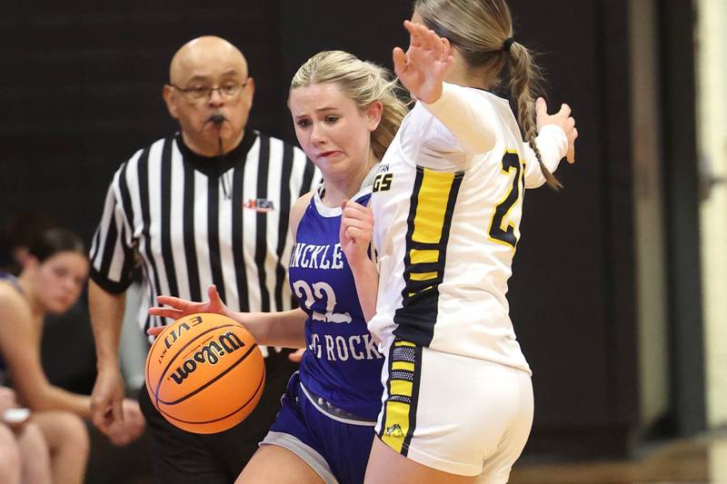 Hinckley-Big Rock's Anna Hermann is fouled by Yorkville Christian’s Danielle Bulson during their Class 1A regional game Tuesday, Feb. 17, 2025, at Indian Creek High School in Shabbona.