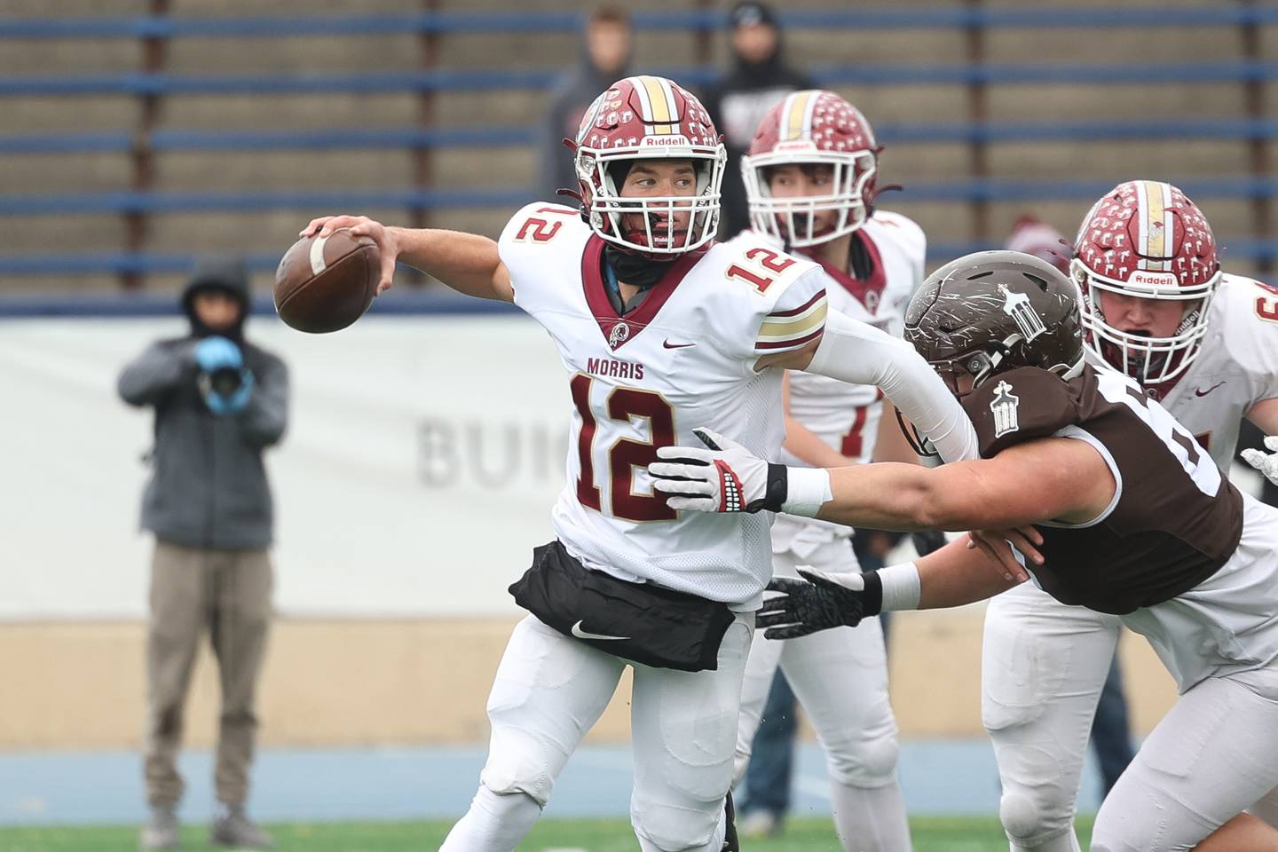 Morris’ Brady Varner passes out of pressure against Joliet Catholic in the Class 5A semifinal on Saturday, Nov. 23, 2024.