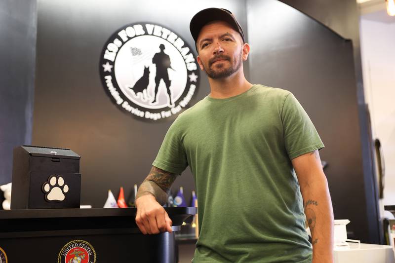 Samson Garcia, a disabled Army veteran, owner of Samson Wood Services, poses for a photo at K9s For Veterans Outlet Store where he sells some of his work in Bolingbrook, Thursday, July 25, 2024.