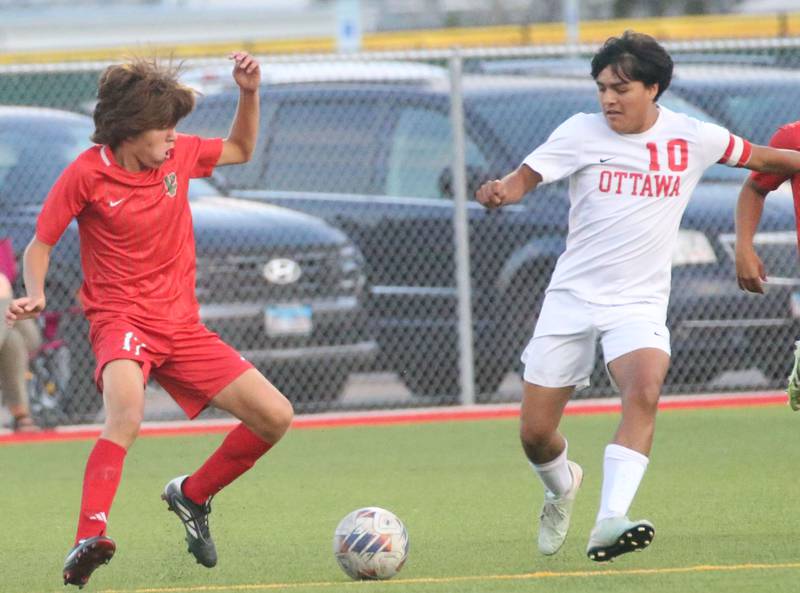 L-P's Jamie Gonzalez and Ottawa's Christian Solis run toward the ball on Monday, Oct. 6, 2025 at the L-P Athletic Complex in La Salle.