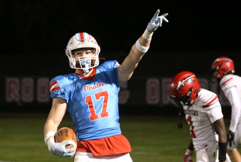 Ottawa's Owen Sanders points to the super fans after scoring a touchdown against Granite City on Friday, Oct. 24, 2025 on Kingman Field at Ottawa High School.