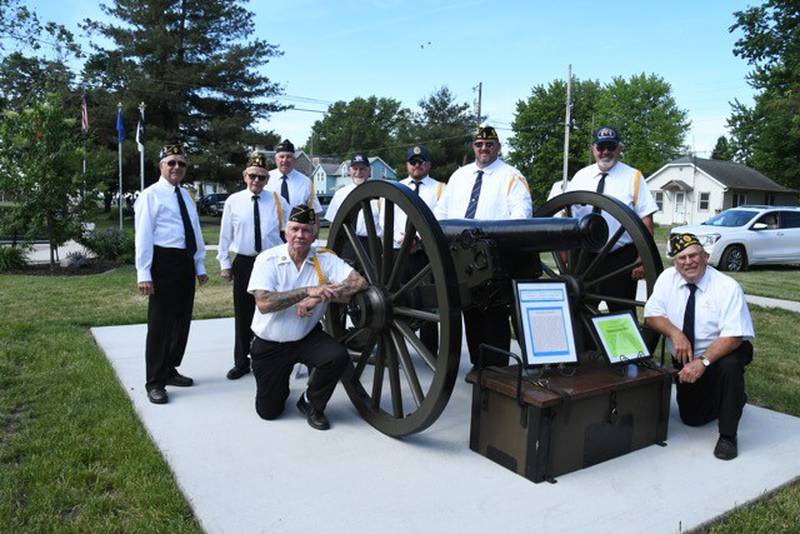 The Neponset cannon was re-dedicated by Neponset-Sheffield American Post #875 members. The members include (L to R) Gary Baze, Bill Scott, Jon Pickering, Mike Yacklich, Justin Stabler, Post Commander Rodney Bennett, and Neponset Mayor Dave Mueller and (Kneeling L to R) Dave Berhens and Post Historian Dick Wells.
