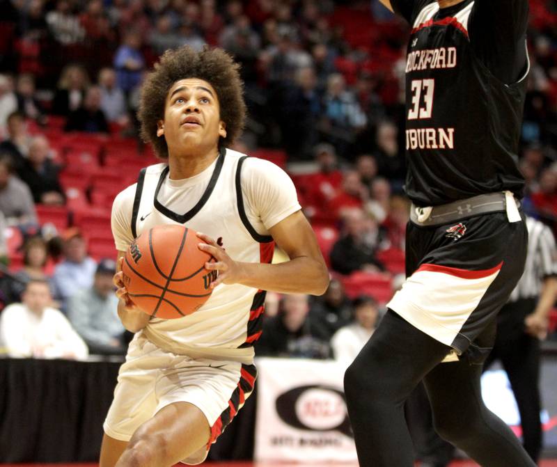 Benet’s Brayden Fagbemi goes up for a shot during the Class 4A NIU Supersectional against Rockford Auburn in DeKalb on Monday, March 6, 2023.