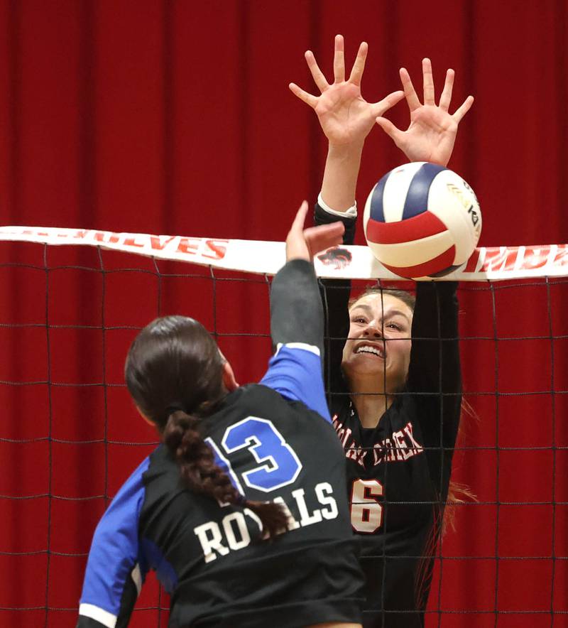 Indian Creek's Isabella Turner tries to block Hinckley-Big Rock's Raven Wagner during their Class 1A regional play-in game Monday, Oct. 28, 2024, at Indian Creek High School in Shabbona.