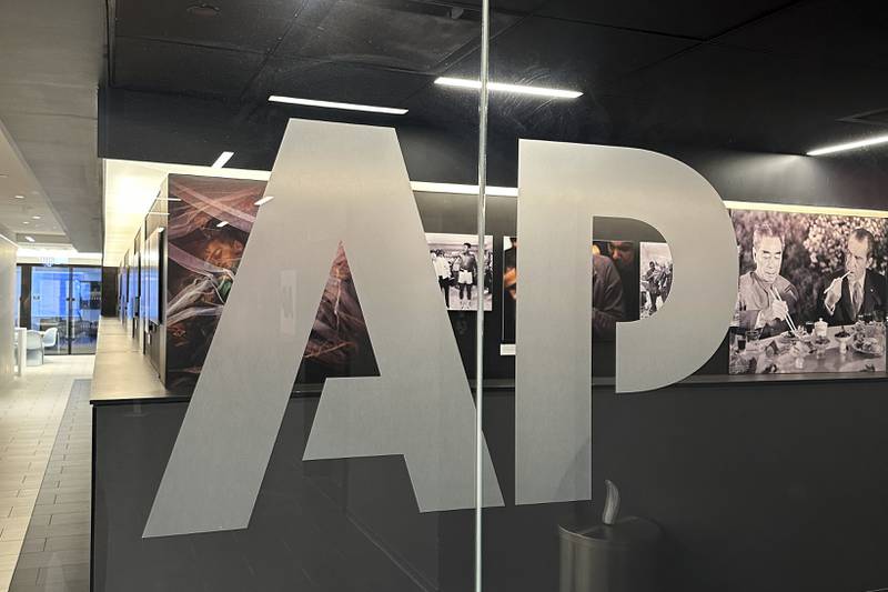 The Associated Press logo is displayed at the news organization's world headquarters in New York on Wednesday, April 9, 2025. (AP Photo/Aaron Jackson)