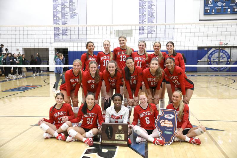 Benet players celebrate their Class 4A St. Charles North Supersectional win on Monday, Nov. 11, 2024 against New Trier.