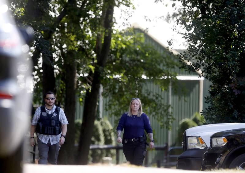 McHenry County Sheriff’s deputies investigate a shooting in the  8900 block of East Tryon Grove Road Thursday, Oct. 10, 2024.