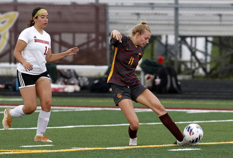 Richmond-Burton's Margaret Slove takes a shot on goal during a IHSA Division 1 Richmond-Burton Sectional semifinal soccer match against Woodlands Academy Tuesday, May 16, 2023, at Richmond-Burton High School.