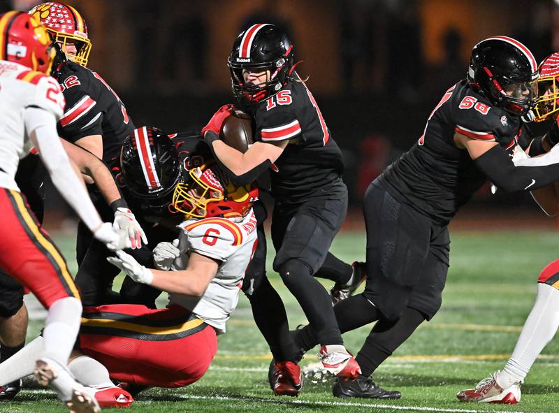 Lincoln-Way Central's Tyler Tulk (15) runs the ball during the Class 7A semifinal playoff game against Batavia on Saturday, Nov 23, 2024 at New Lenox. (Dean Reid for Shaw Local News)