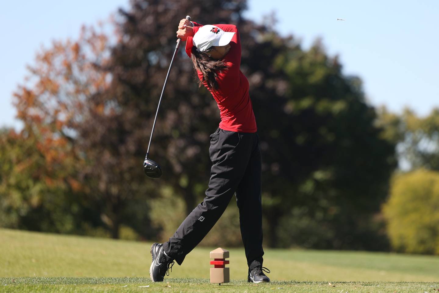 Yorkville’s Mia Natividad tees off at the Hinsdale South Girls Class 2A Golf Sectional at Village Greens of Woodridge. Monday, Oct. 3, 2022, in Darien.
