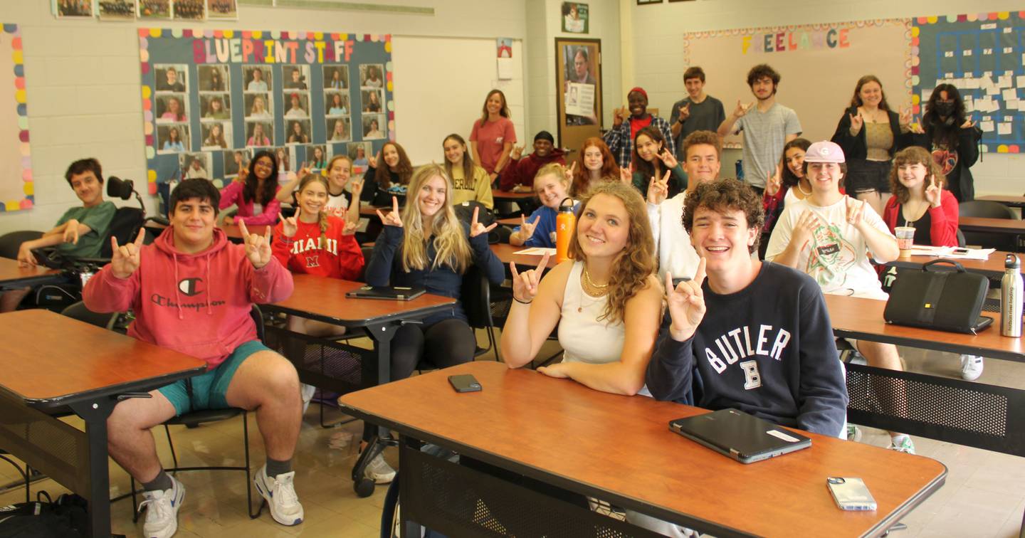 The Journalism class at South High cheers on the editors-in-chief as they accept the grant from the Illinois Press Foundation.