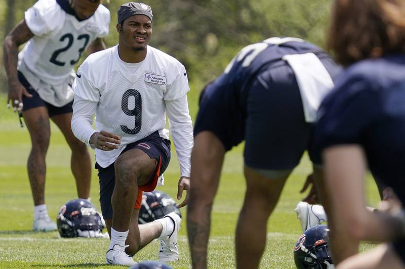 Chicago Bears defensive back Jaquan Brisker warms up with teammates May 17 at Halas Hall in Lake Forest.