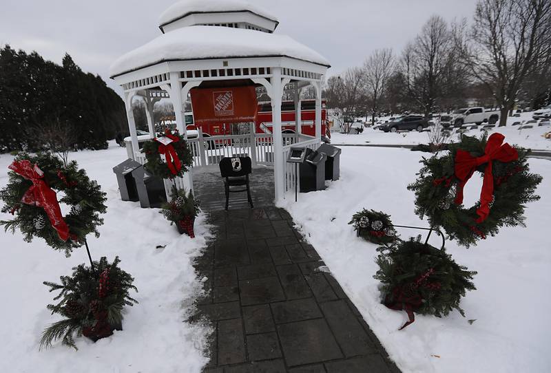 POW/MIA Wreaths line the sidewalk to the gazebo during McHenry's Wreath Laying Ceremony in honor of fallen veterans on Friday, Dec. 5, 2025, at St. Mary's Catholic Cemetery in McHenry. The event was hosted by McHenry American Legion Post 491 and Team Home Depot.